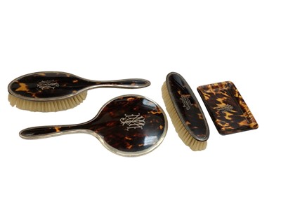 Lot 1126 - Four piece silver mounted faux tortoiseshell toiletry set