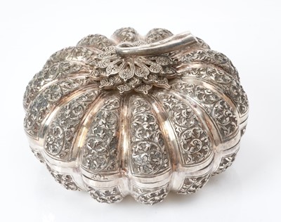 Lot 181 - Far Eastern white metal Betel Nut box, in the form of a gourd, with embossed foliate sections