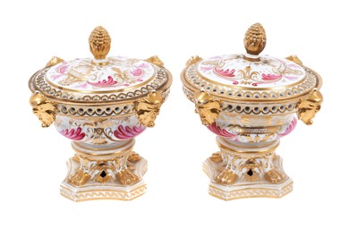 Lot 5 - Pair of early 19th century Derby pot pourri, of urn form, the rims pierced, with applied masks and paw feet on shaped bases, painted in pink enamel and gilt with foliate patterns, marked to bases,...