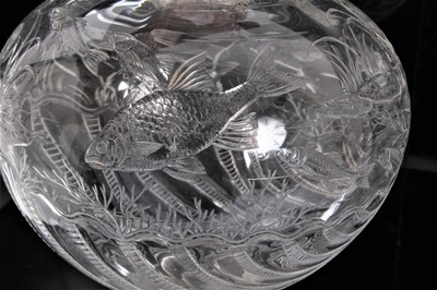 Lot 7 - A pair of late 19th Century Stourbridge clear crystal glass decanters, possibly Thomas Webb & Sons, the body polished intaglio engraved with fish swimming above a scallop shell, 31cm high