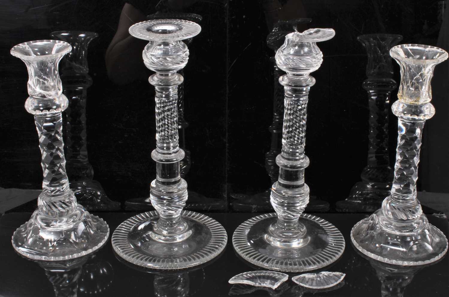 Lot 8 - Two pairs of 19th century cut glass candlesticks, 25cm and 27.5cm high