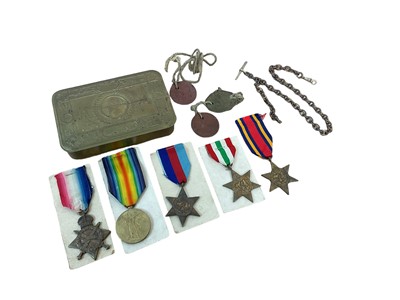 Lot 700 - First World War Princess Mary gift tin, together with a First World War 1914 - 15 Star (naming erased), Victory medal named to 181922 DVR. W. Vaughan. R.E. Second World War 1939 - 1945 Star