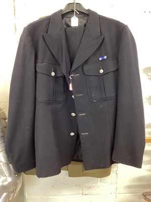 Lot 687 - Royal Army Service Corps Captains Service Dress jacket, together with a Police jacket and various R.A.F uniform in a canvas bag.