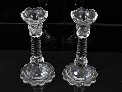 Lot 9 - Group of 19th century cut glass, including a set of four salts, a pair of sweetmeats and covers, a pair of candlesticks and a pair of wine glasses with etched ferns and stags (10)