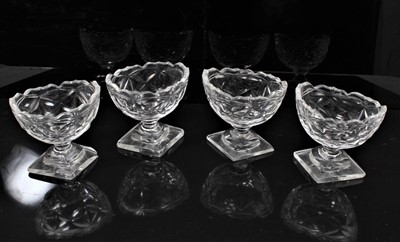 Lot 9 - Group of 19th century cut glass, including a set of four salts, a pair of sweetmeats and covers, a pair of candlesticks and a pair of wine glasses with etched ferns and stags (10)