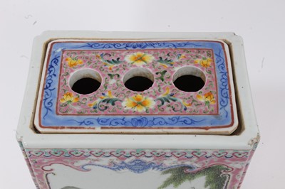 Lot 10 - A Chinese famille rose porcelain flower brick, 20th century, decorated with figural scenes and floral patterns, 20cm high