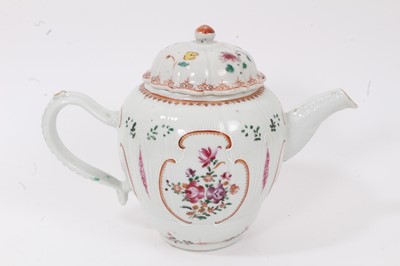 Lot 14 - 18th century Chinese famille rose porcelain teapot, decorated with flowers, together with a tea bowl and saucer decorated in the Mandarin style (3)