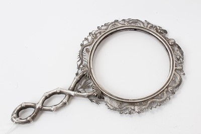 Lot 216 - Chinese white metal hand mirror frame