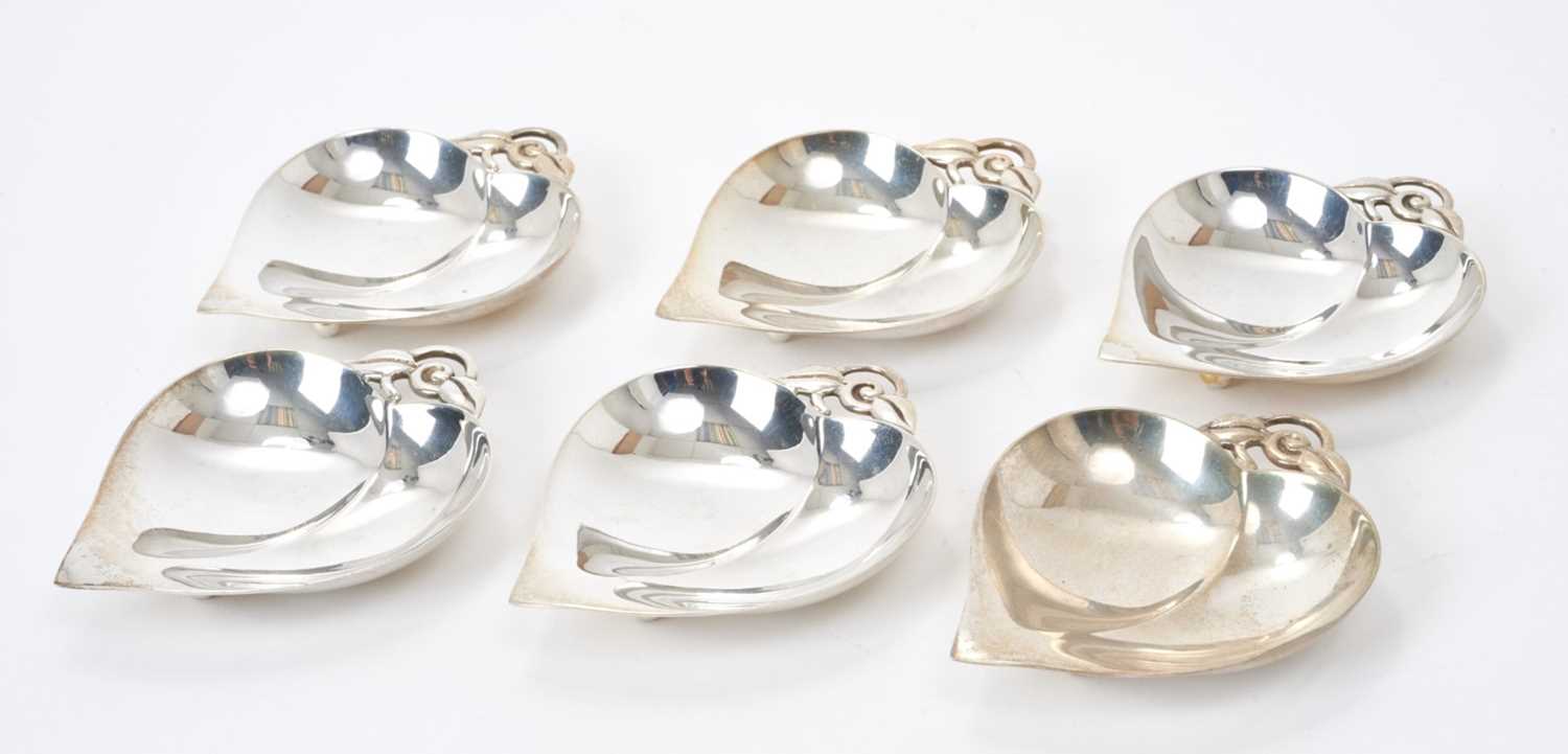 Lot 194 - Set of six Tiffany silver dishes in the form of heart shaped leaves, with leaf handles