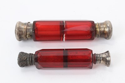 Lot 199 - Large Victorian double ended scent bottle, with ruby glass body and white metal mounts