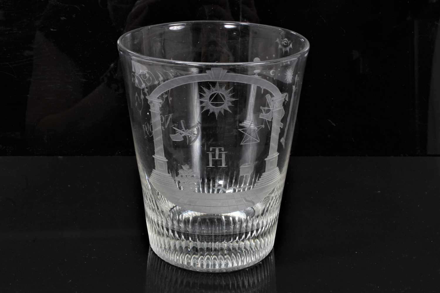 Lot 48 - A large 19th century Scottish Masonic glass tumbler, the tapered cylindrical beaker with engraved Masonic devices and lodge number 391 for Lodge Zetland, The Provincial Grand Lodge of Stirlingshire...