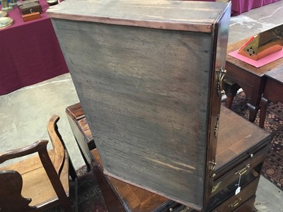 Lot 1116 - George I walnut and crossbanded chest of drawers, with caddy moulded top and brushing slide over four graduated drawers on bracket feet, 75cm wide x 44cm deep x 77cm high