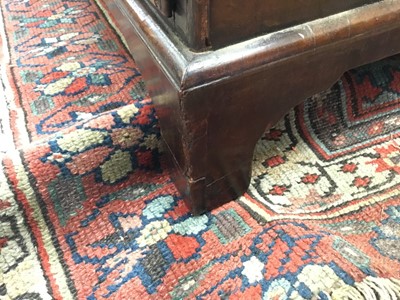 Lot 1116 - George I walnut and crossbanded chest of drawers, with caddy moulded top and brushing slide over four graduated drawers on bracket feet, 75cm wide x 44cm deep x 77cm high