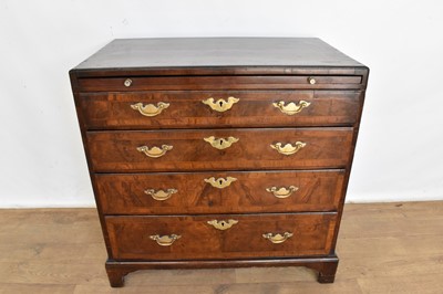 Lot 1116 - George I walnut and crossbanded chest of drawers, with caddy moulded top and brushing slide over four graduated drawers on bracket feet, 75cm wide x 44cm deep x 77cm high