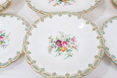 Lot 19 - Mid-19th century English porcelain dessert service, comprising sixteen plates, three footed dishes, and one centrepiece, painted with flowers on a blue and gilt fleur-de-lis border (20)
