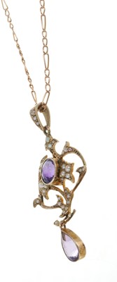 Lot 383 - Edwardian 9ct rose gold amethyst and seed pearl pendant on chain