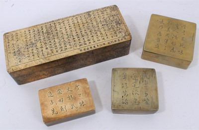 Lot 649 - Large Chinese paktong ink box with ornate script panel and gold splash ornament, 19cm long, together with three further ink boxes