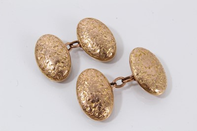 Lot 333 - Pair of Victorian 9ct gold cufflinks with engraved floral decoration, Birmingham 1896.