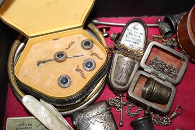 Lot 337 - A Victorian jewellery box containing a good collection of Victorian and Edwardian silver jewellery to include a Victorian silver posy holder/brooch, Victorian silver locket, Victorian name brooches...