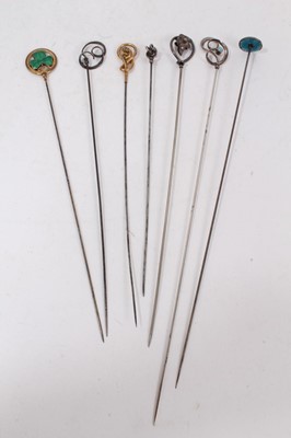 Lot 337 - A Victorian jewellery box containing a good collection of Victorian and Edwardian silver jewellery to include a Victorian silver posy holder/brooch, Victorian silver locket, Victorian name brooches...