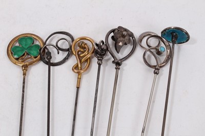 Lot 337 - A Victorian jewellery box containing a good collection of Victorian and Edwardian silver jewellery to include a Victorian silver posy holder/brooch, Victorian silver locket, Victorian name brooches...