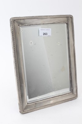 Lot 263 - Edwardian silver dressing table mirror of rectangular form with bevelled glass plate