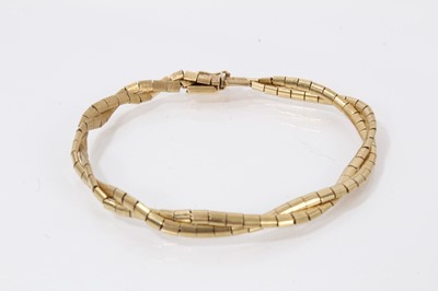 Lot 359 - Italian 18ct yellow gold bracelet with two strands of plaited links, 19cm.