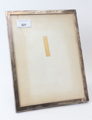 Lot 227 - Contemporary silver photograph frame of rectangular form with easel back