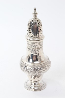 Lot 232 - George III silver caster of baluster form, with embossed scroll and foliate decoration