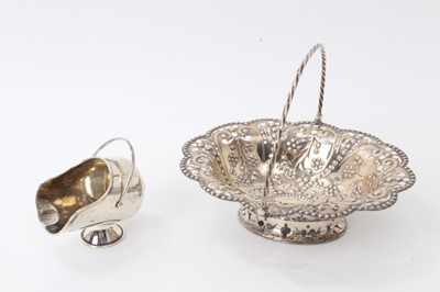 Lot 235 - Victorian silver swing handled sweet meat basket, with pierced and embossed decoration