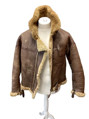 Lot 688 - Vintage Irvin style brown leather and sheepskin flying jacket, the zip marked lightning, estimated to be around a medium in size.