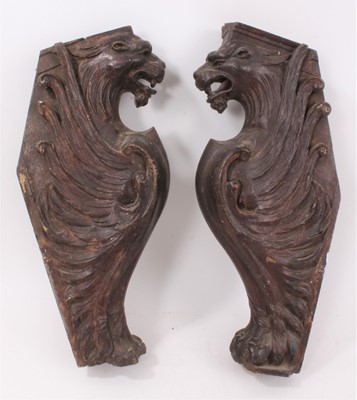 Lot 674 - Pair of 19th century carved wooden lion-form corbels