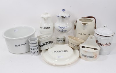 Lot 1409 - Group of late 19th/early 20th century white glazed kitchen vessels titled in black, including two 'Hot Water' jugs, two 'Butter' dishes, 'Clotted Cream', 'Waterwell', 'Toast & Water' jug, 'Hot Pot'...