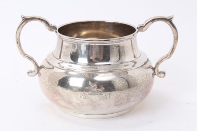 Lot 266 - George VI silver sugar bowl of cauldron form with engraved armorial and presentation inscription to underside, (London 1937), 7ozs, 15cm in diameter