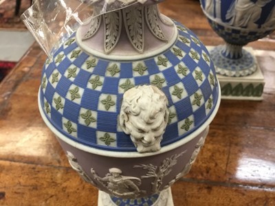 Lot 92 - Rare garniture of three 19th century Wedgwood jasper ware vases