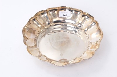 Lot 268 - Contemporary silver bowl of circular panelled form