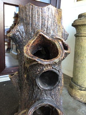 Lot 1363 - Pair of unusual 19th century salt glazed stoneware planters, naturalistically modelled as tree trunks with textured finish, 64cm high.