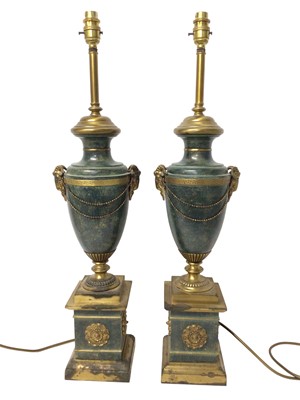 Lot 667 - Pair of good quality table lamps of classical urn form with ram's head mounts, on stepped square pedestals, 71cm high overall