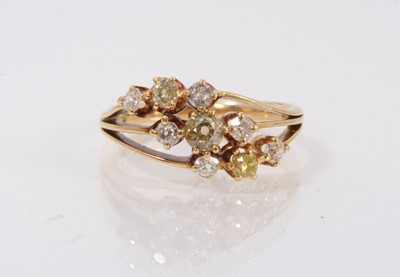 Lot 405 - Late Victorian diamond triple crossover ring with three bands of old cut diamonds, each comprising a central fancy yellow diamond flanked by  two further old cut diamonds, in claw setting on yellow...