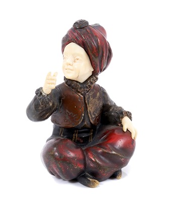 Lot 664 - Austrian cold painted bronze and ivory seated Turkish figure