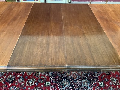 Lot 1205 - Large Edwardian oak extending dining table