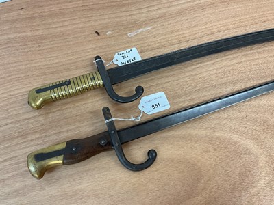 Lot 851 - French 1866 pattern Chassepot bayonet together with a French 1874 pattern Gras bayonet, both lacking scabbards (2).