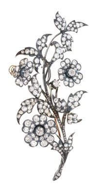 Lot 443 - Victorian diamond floral spray brooch with en tremblant flowers