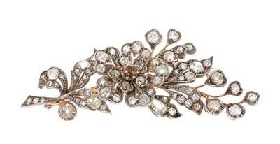 Lot 444 - Victorian diamond floral spray brooch with en tremblant flower with a coloured diamond to the centre