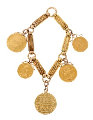 Lot 447 - Gold charm bracelet with five gold coins