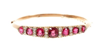 Lot 449 - Victorian diamond and red spinel hinged bangle