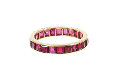 Lot 453 - Ruby eternity ring with a full band of rubies