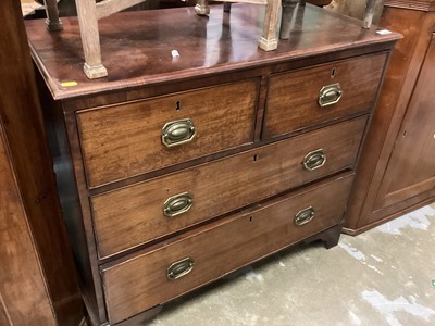 Lot 1369 - George III mahogany chest of four drawers.