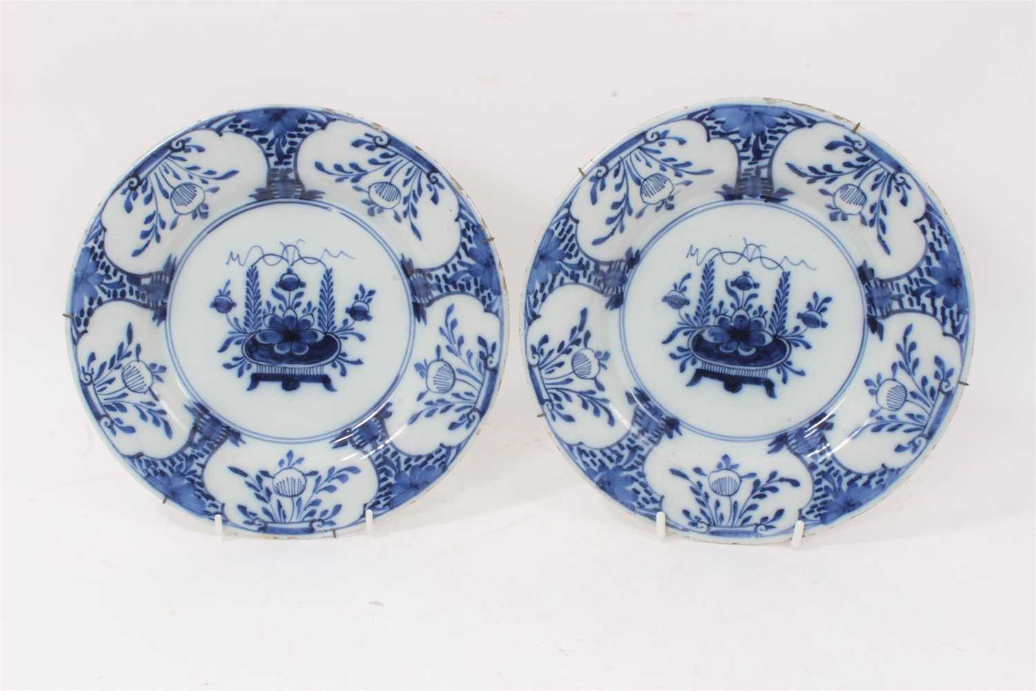 Lot 21 - Pair of 18th century blue and white delft plates