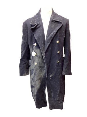 Lot 683 - Elizabeth II Royal Navy Wrens uniform - to include no. 1 dress jacket with badges and insignia, raincoat, great coat, jacket, three skirts and various cloth badges, together with a large collection...